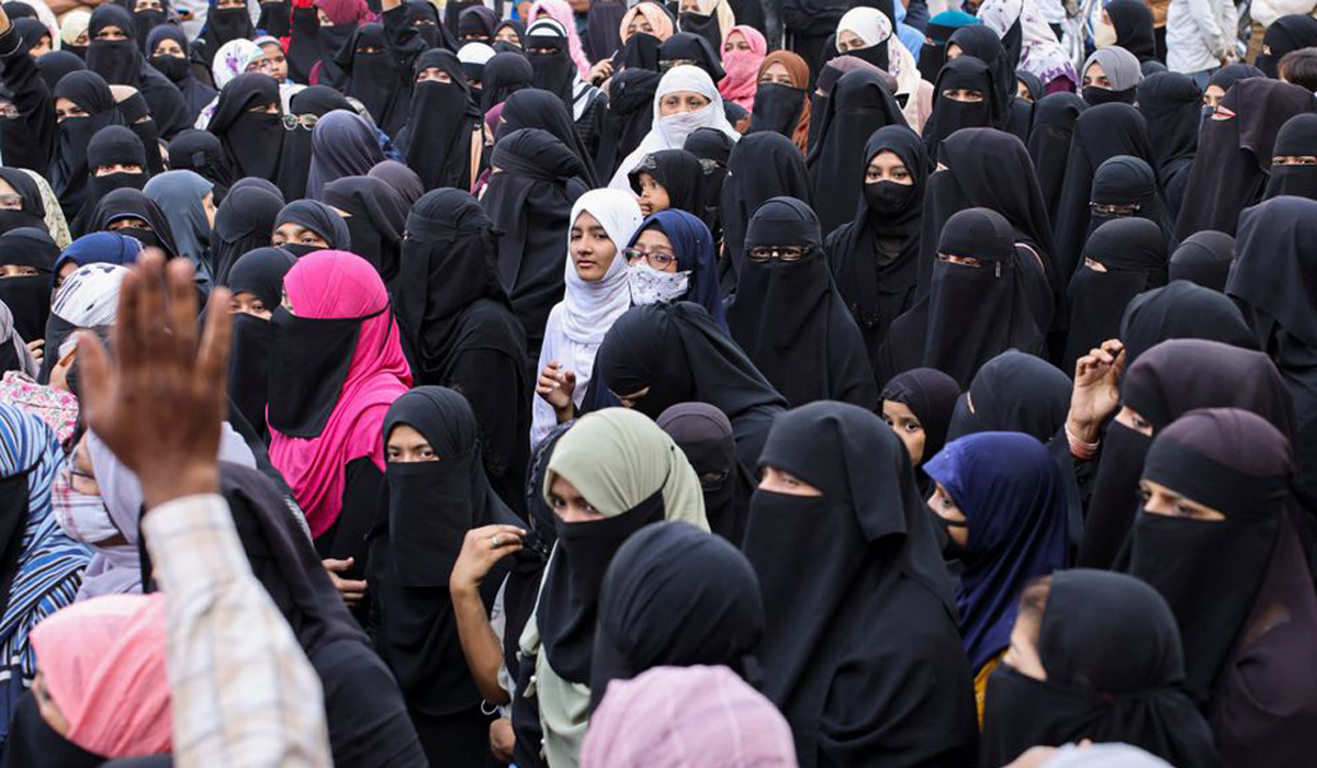 Women wearing hijabs attend a protest against the recent hijab ban in few colleges of Karnataka state